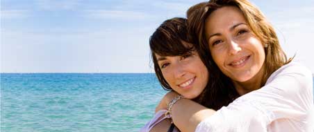 Mother and daughter on a beach