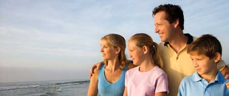 Family relaxing on a beach